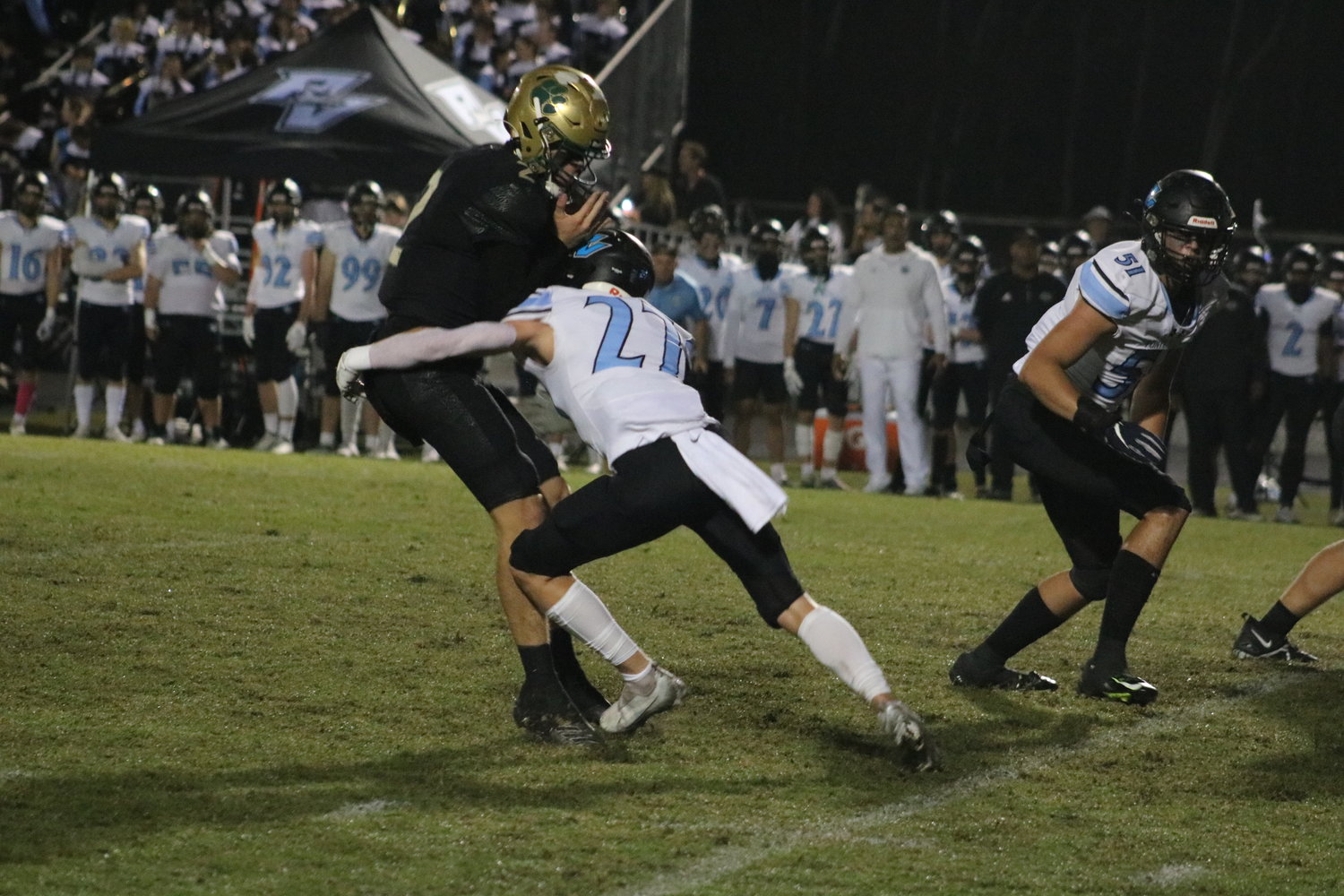Ponte Vedra’s James Richardson hits Marcus Stokes of Nease in the backfield.